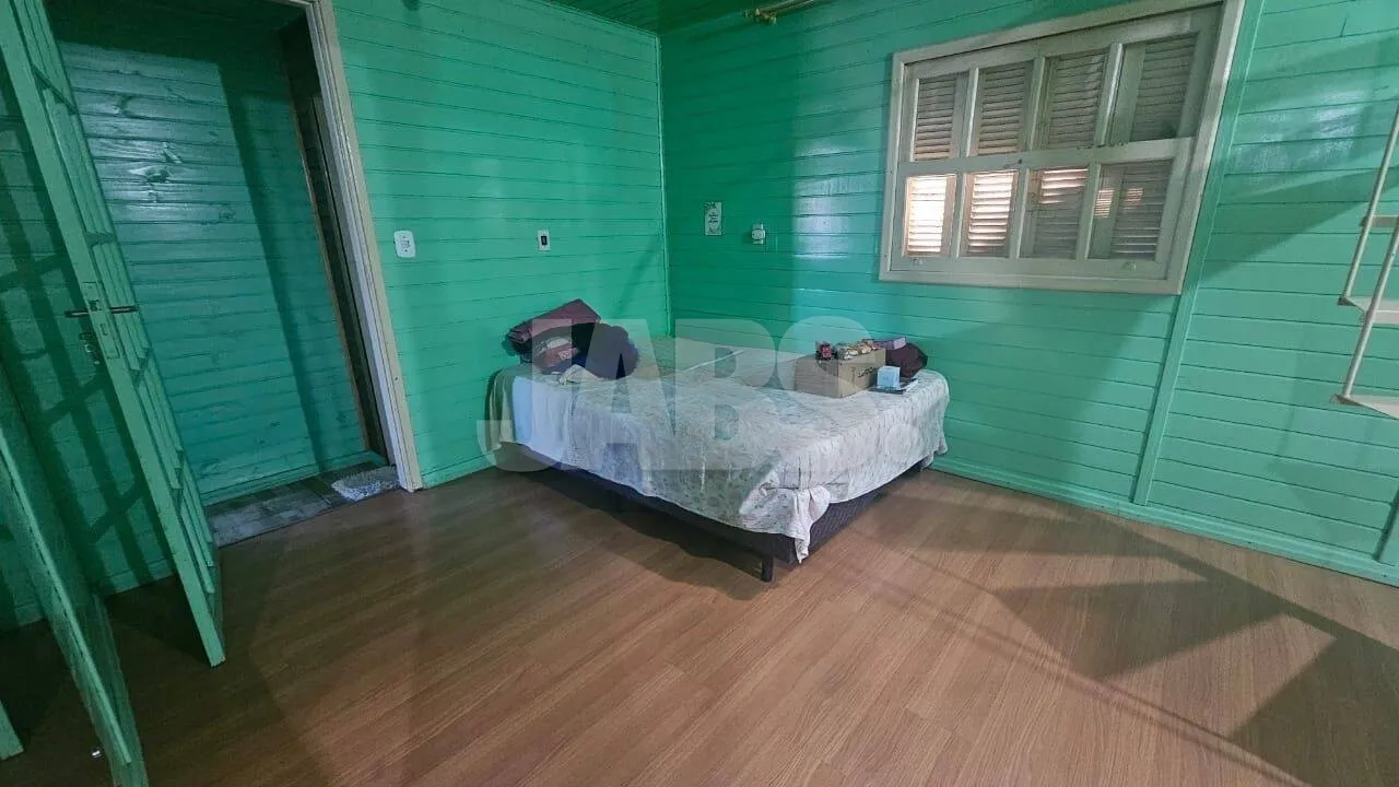 Terreno com 2 casas alugadas na Vila do Cedro, foto 4