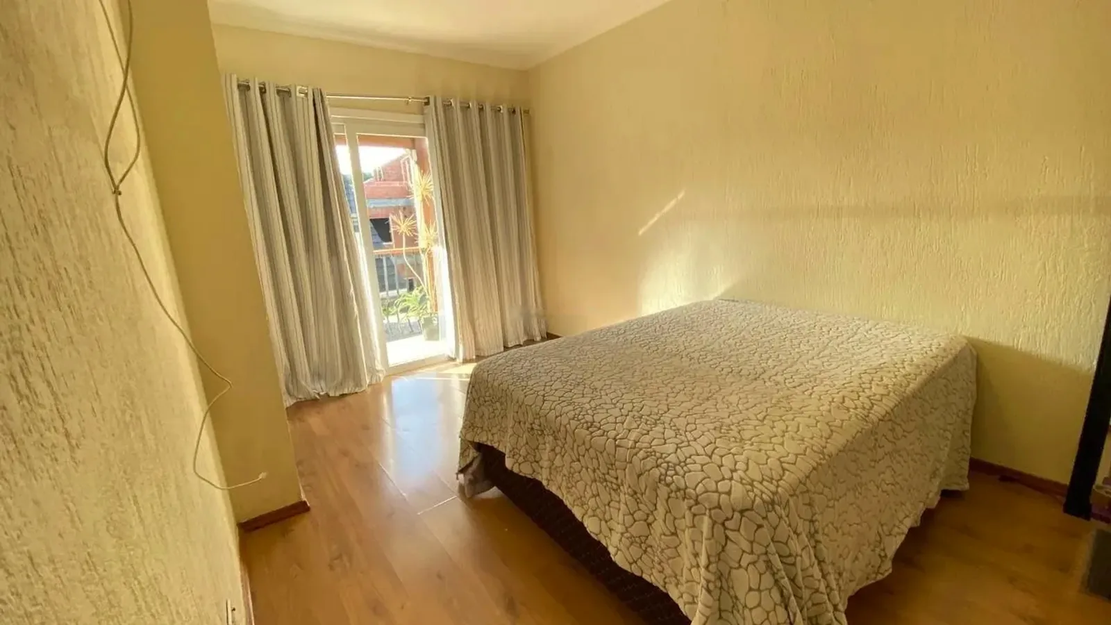 Suíte com porta para a sacada