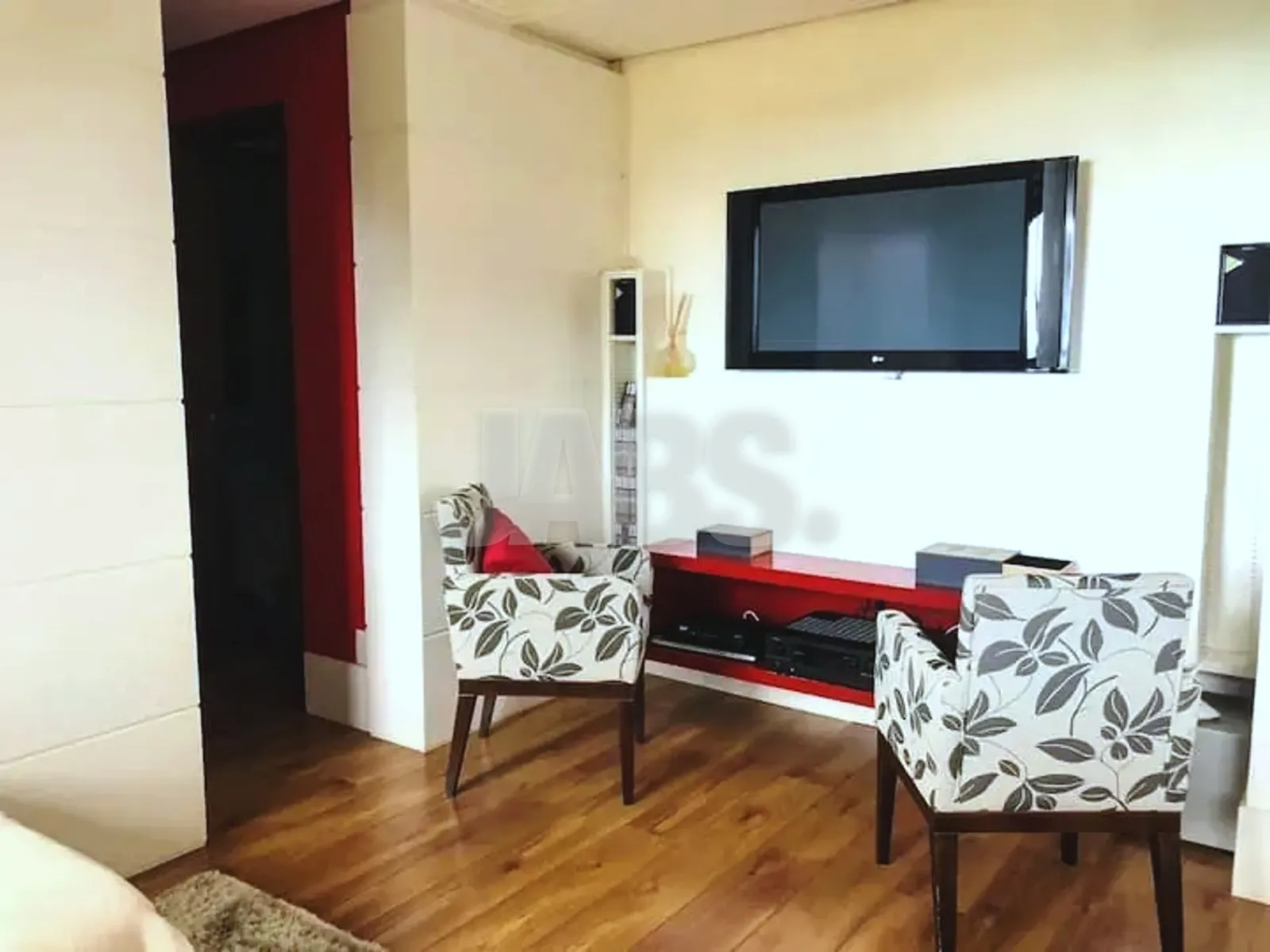 Sala de TV com poltronas