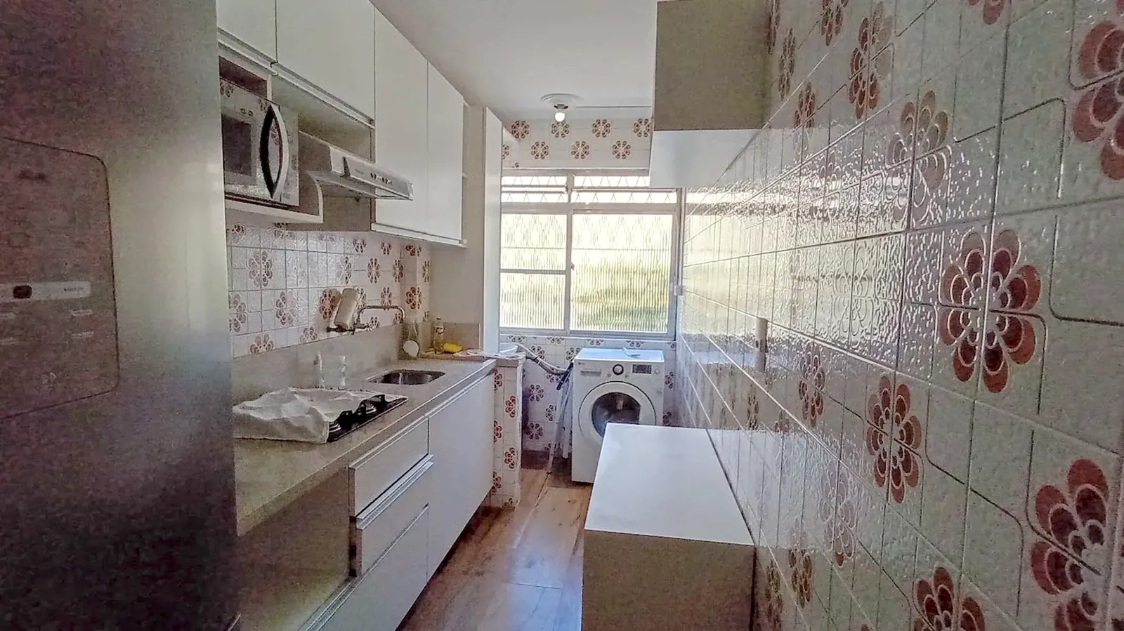 Cozinha integrada à área de serviço